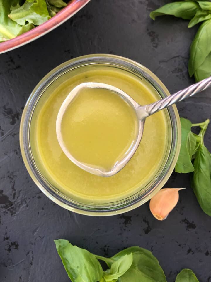 white balsamic dressing recipe with small ladle