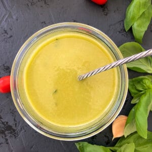 white balsamic dressing with ladle