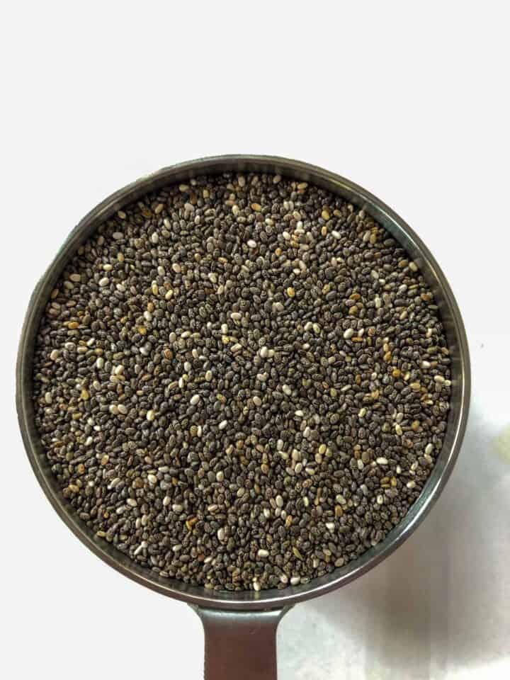 chia seeds in a dry measuring cup