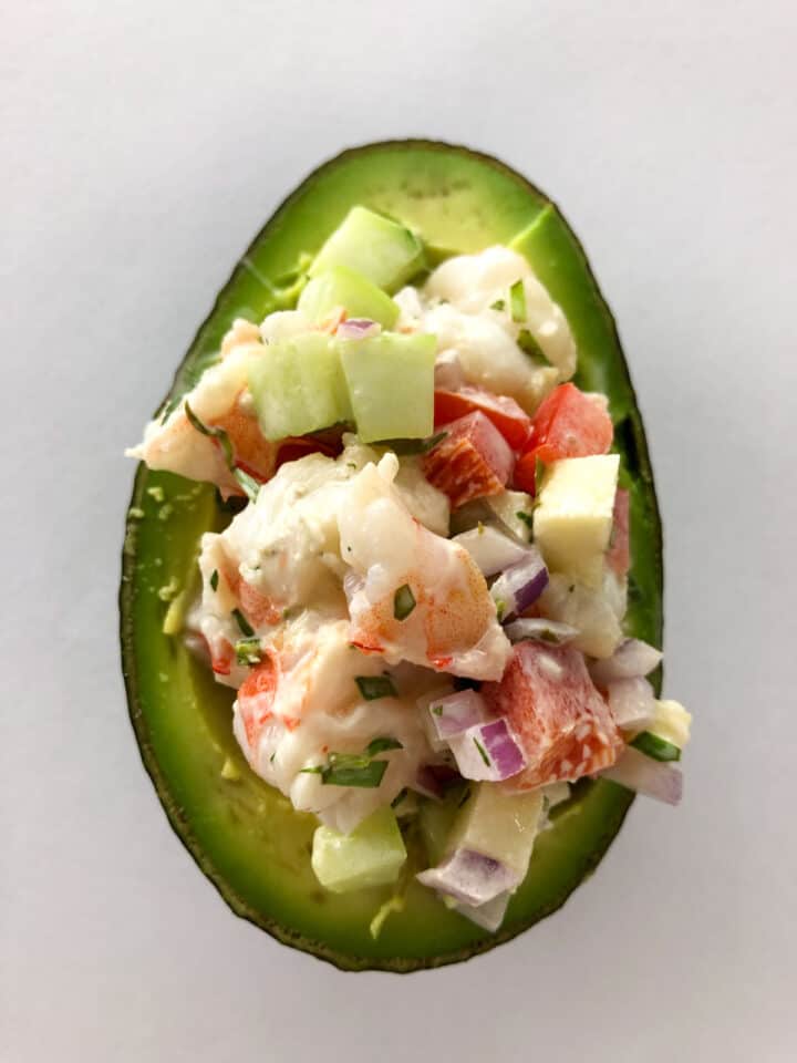 shrimp salad stuffed avocados over head shot