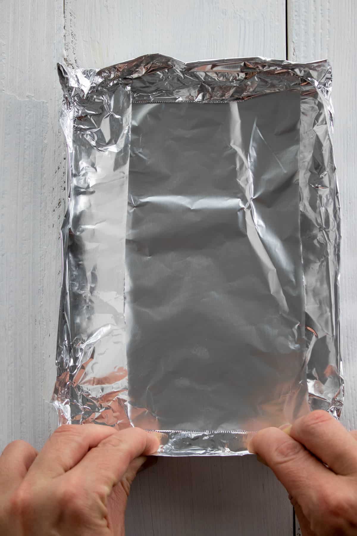 Making an aluminum foil package.