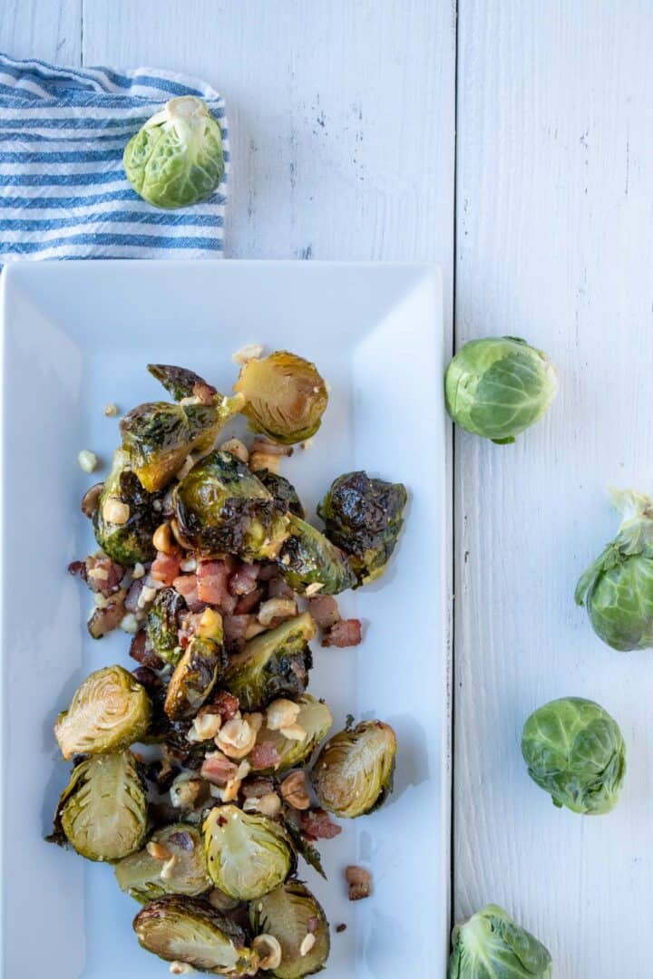 oven roasted brussels sprouts on a rectangle platter