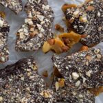 almond toffee on parchment paper