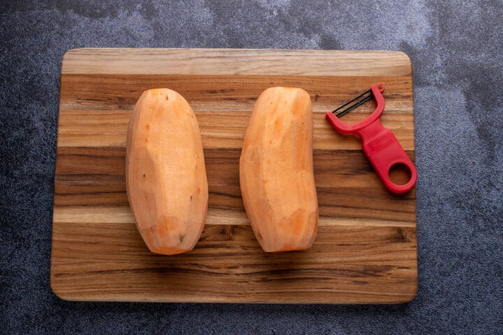 Peeling sweet potatoes.