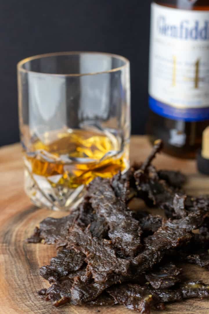 the best beef jerky recipe with a glass of scotch