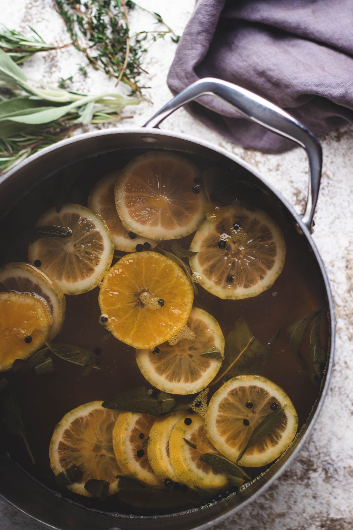 Citrus turkey brine in a pot.