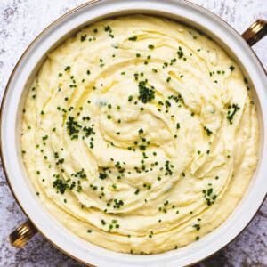 Mashed potatoes with chives on top.