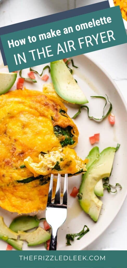 Omelette on a white plate, taking a bite with a fork.