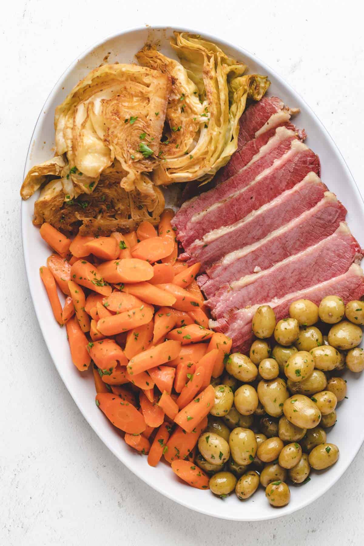 Overhead photo of cooked corn beef on a platter.