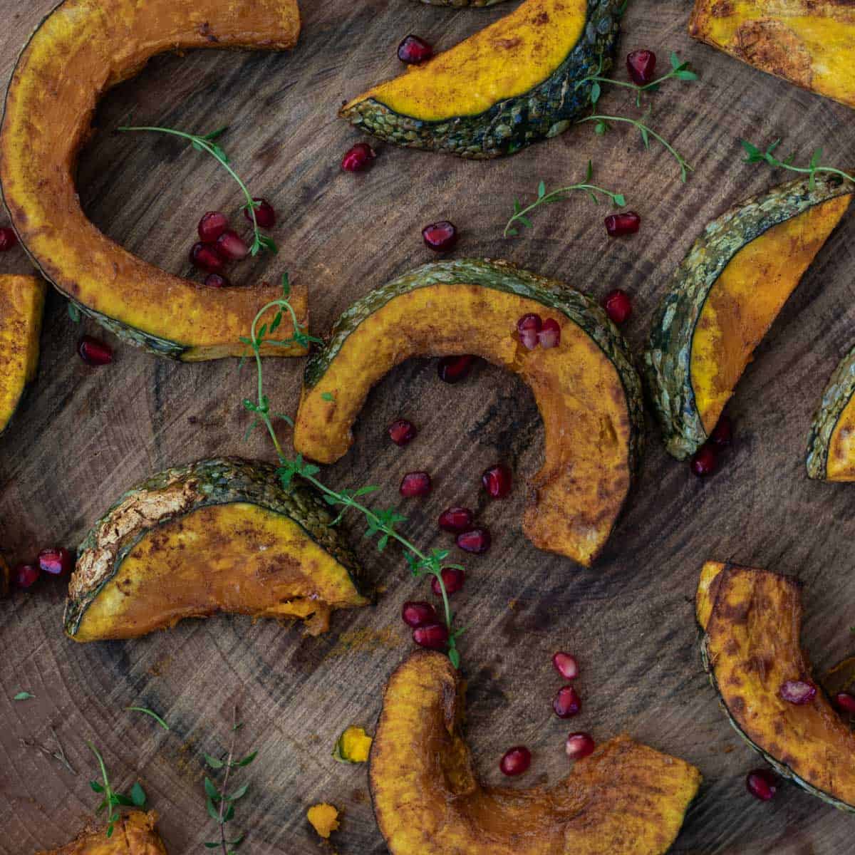 Roasted Kabocha squash with garnished with fresh thyme.