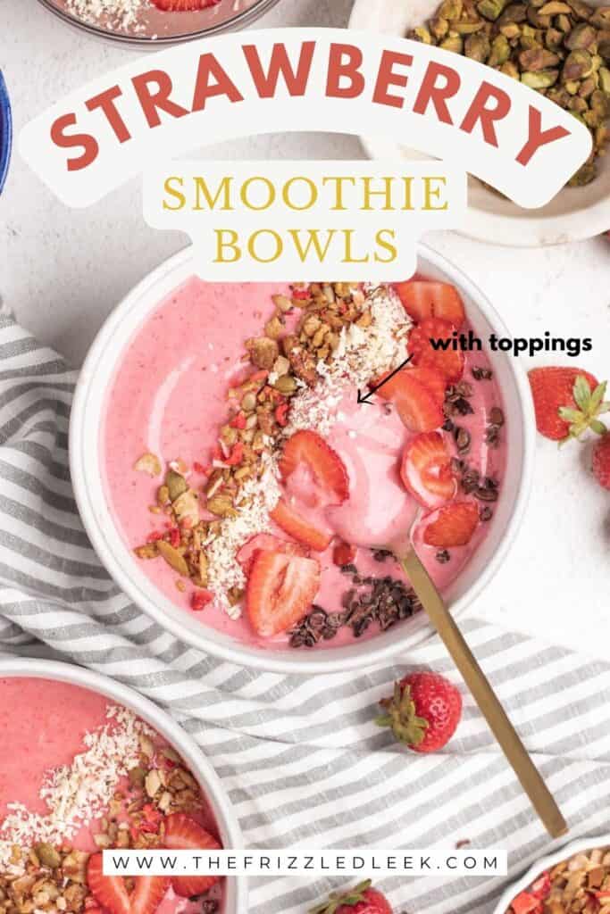 Strawberry smoothie bowl with granola, coconut, chocolate, and strawberry toppings.