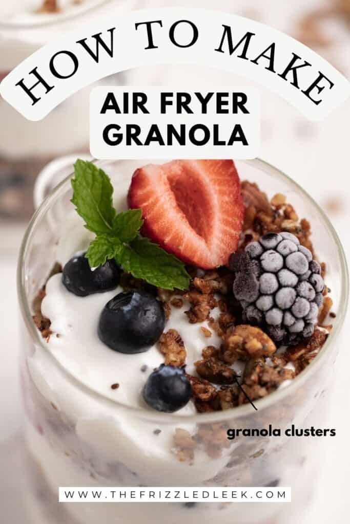 A yogurt parfait with air fryer granola inside of a glass jar.