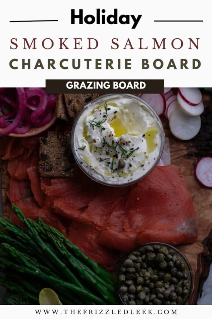 Smoked salmon and a cream cheese spread on a wooden platter.